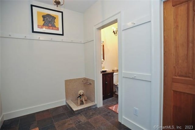 33 Sentry Hill Rd, Roxbury, CT 06783 - hallway with baseboards and stone finish floor