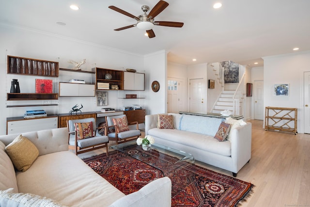 38 Yarmouth Rd, Norwalk, CT 06853 - living area with crown molding, ceiling fan, recessed lighting, stairway, and light wood finished floors