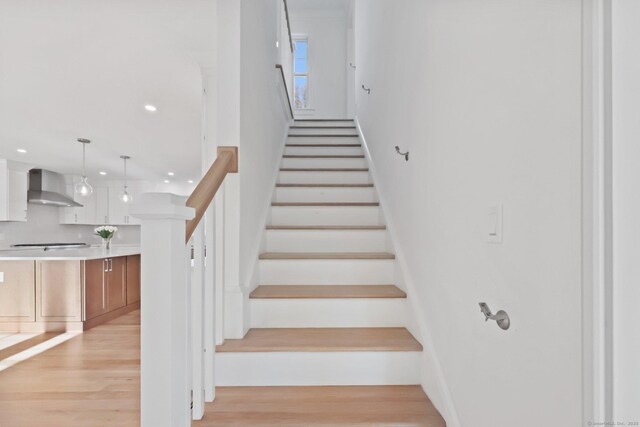 71 Reid St, Fairfield, CT 06824 - stairway featuring wood finished floors and recessed lighting
