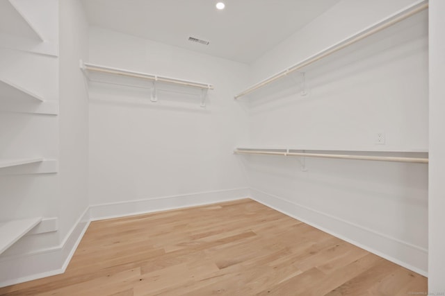 71 Reid St, Fairfield, CT 06824 - walk in closet with wood finished floors