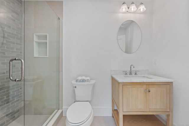 71 Reid St, Fairfield, CT 06824 - bathroom featuring a stall shower, toilet, vanity, and baseboards
