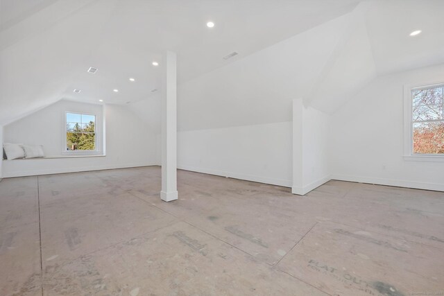 71 Reid St, Fairfield, CT 06824 - bonus room with lofted ceiling, healthy amount of natural light, baseboards, and recessed lighting