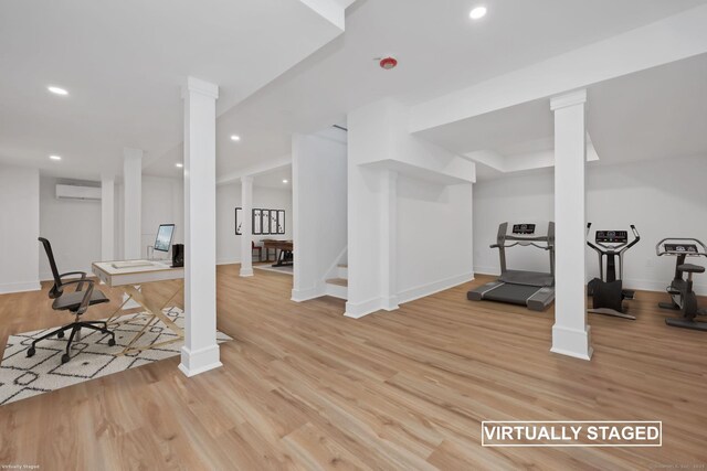 71 Reid St, Fairfield, CT 06824 - exercise area featuring a wall mounted AC, light wood-style floors, recessed lighting, and baseboards