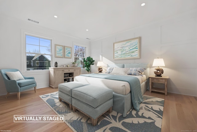 71 Reid St, Fairfield, CT 06824 - bedroom featuring light wood-type flooring, recessed lighting, and baseboards