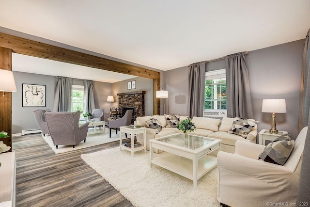 18 Tunnel Rd, Roxbury, CT 06783 - living area with a baseboard heating unit, wood finished floors, a fireplace, and baseboards