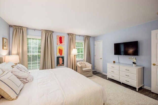 18 Tunnel Rd, Roxbury, CT 06783 - bedroom with wood finished floors and multiple windows
