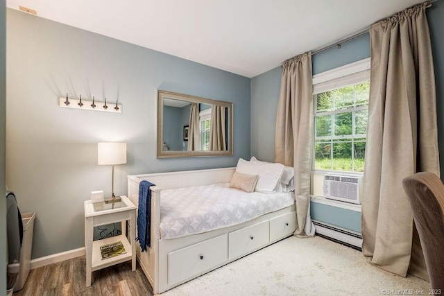 18 Tunnel Rd, Roxbury, CT 06783 - bedroom with a baseboard heating unit, cooling unit, wood finished floors, and baseboards