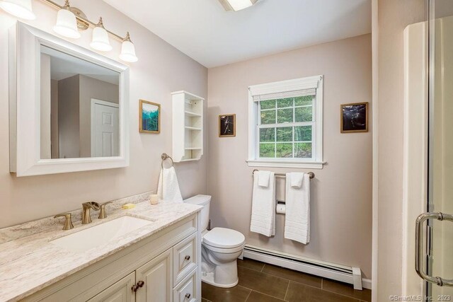 18 Tunnel Rd, Roxbury, CT 06783 - full bathroom featuring a baseboard heating unit, vanity, and tile patterned floors