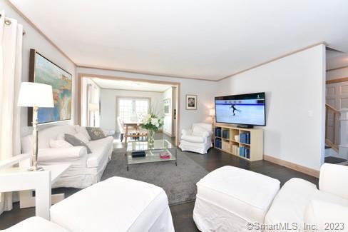 living room featuring baseboards