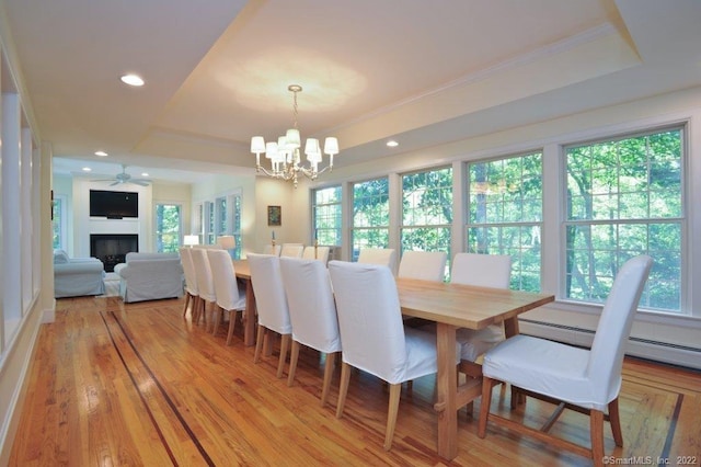 45 Moosehorn Rd, Roxbury, CT 06783 - dining room with ornamental molding, a tray ceiling, light wood finished floors, and recessed lighting