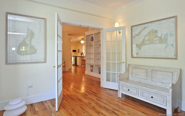 45 Moosehorn Rd, Roxbury, CT 06783 - corridor featuring baseboards, ornamental molding, french doors, and light wood-type flooring