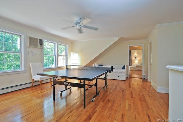 45 Moosehorn Rd, Roxbury, CT 06783 - recreation room with light wood finished floors, crown molding, an AC wall unit, and a ceiling fan