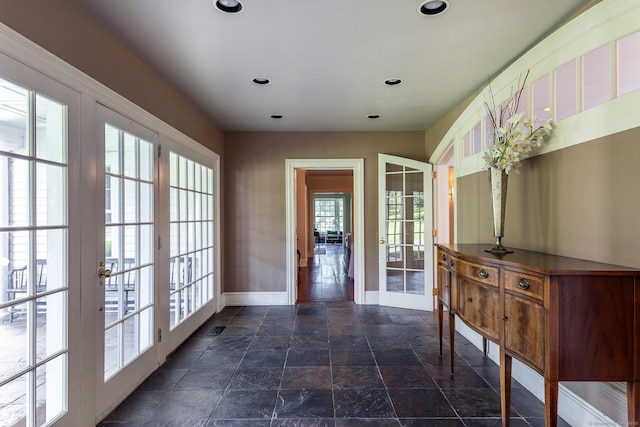 10 Sunny Ridge Rd, Washington, CT 06793 - doorway to outside with stone tile floors, recessed lighting, and french doors