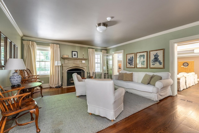 10 Sunny Ridge Rd, Washington, CT 06793 - living room featuring plenty of natural light, wood finished floors, ornamental molding, and a fireplace with flush hearth