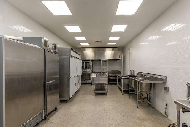 10 Sunny Ridge Rd, Washington, CT 06793 - kitchen featuring light floors and freestanding refrigerator
