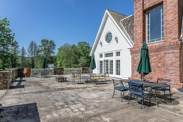 10 Sunny Ridge Rd, Washington, CT 06793 - view of patio / terrace with outdoor dining area and a fire pit