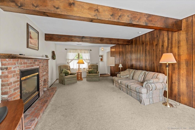 129 Mohawk Dr, Wallingford, CT 06492 - living area featuring a brick fireplace, carpet floors, beam ceiling, and wooden walls