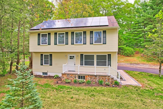 76 Three Mile Hill Rd, Middlebury, CT 06762 - colonial house with solar panels, a front lawn, and a porch