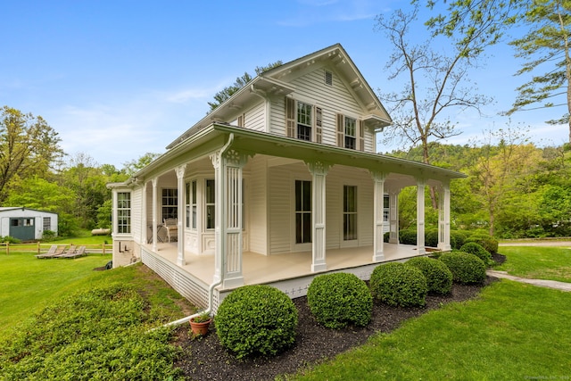 4 Lime Rock Holw, Salisbury, CT 06039 - view of side of property with covered porch and a yard