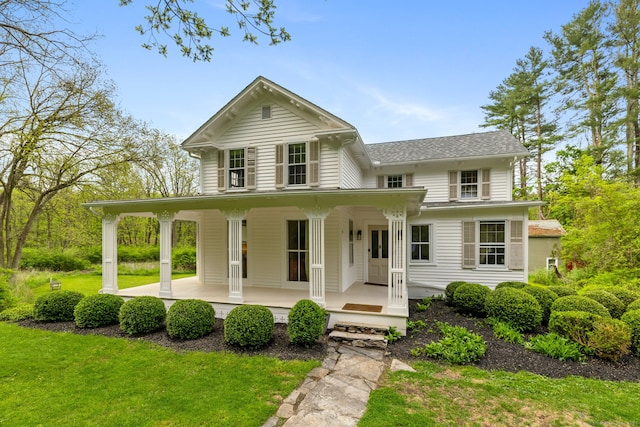 4 Lime Rock Holw, Salisbury, CT 06039 - view of front of property with a porch, a front lawn, and a shingled roof
