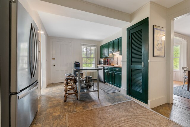 4 Lime Rock Holw, Salisbury, CT 06039 - dining space with radiator heating unit and dark stone finish flooring
