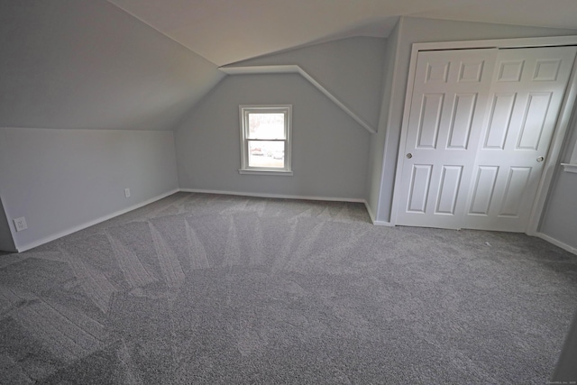 136 Cooper Dr, Waterbury, CT 06704 - additional living space featuring carpet, baseboards, and vaulted ceiling