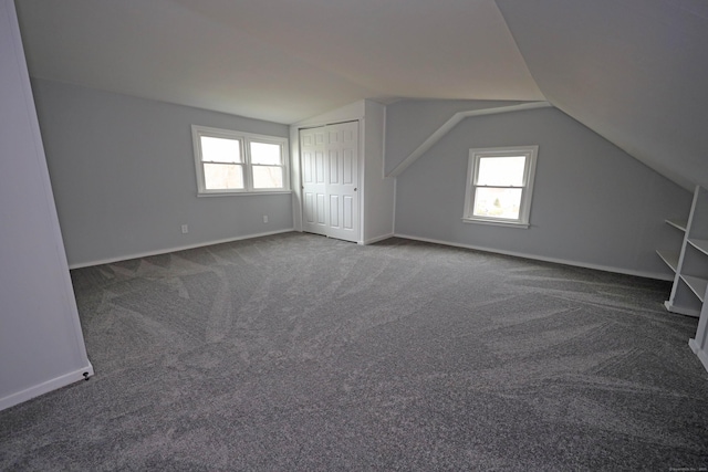 136 Cooper Dr, Waterbury, CT 06704 - bonus room with a wealth of natural light, lofted ceiling, carpet floors, and baseboards