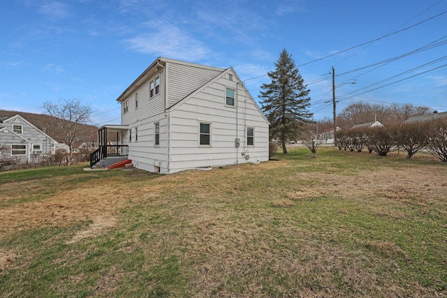 136 Cooper Dr, Waterbury, CT 06704 - view of side of home featuring a lawn