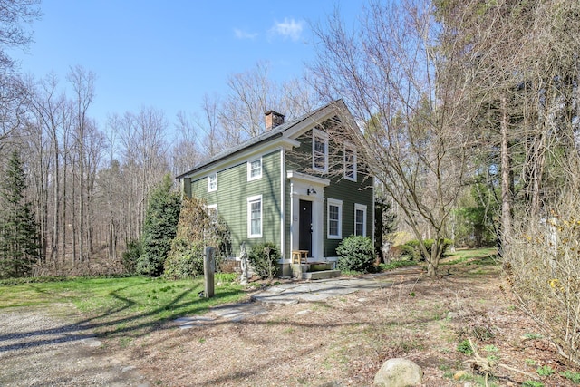 270 Berkshire Rd, Newtown, CT 06482 - view of front facade featuring a front lawn and a chimney