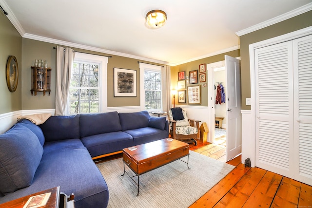 270 Berkshire Rd, Newtown, CT 06482 - living area with crown molding, wainscoting, and hardwood / wood-style flooring