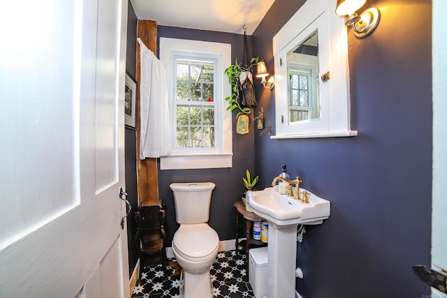 270 Berkshire Rd, Newtown, CT 06482 - half bathroom with toilet and baseboards