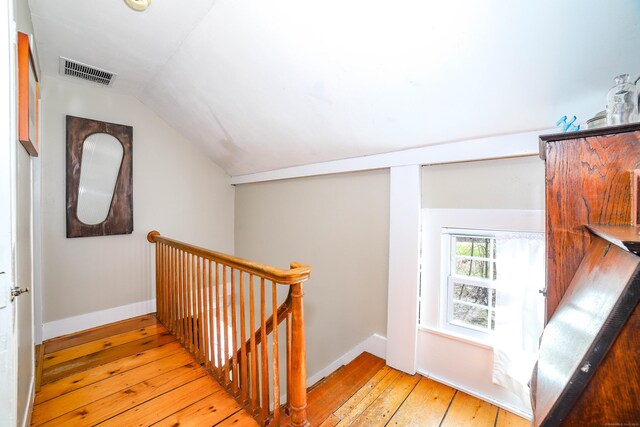 270 Berkshire Rd, Newtown, CT 06482 - stairs featuring baseboards, visible vents, hardwood / wood-style flooring, and vaulted ceiling
