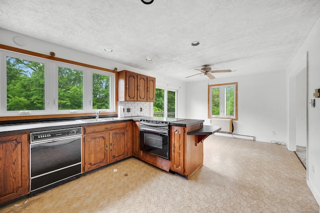 18 Hillcrest Dr, Somers, CT 06071 - kitchen featuring black dishwasher, electric stove, a peninsula, brown cabinetry, and recessed lighting