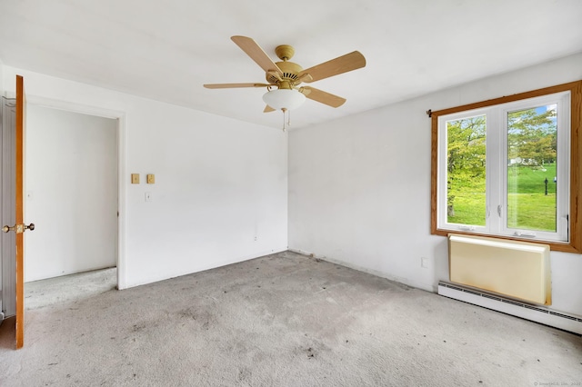18 Hillcrest Dr, Somers, CT 06071 - empty room with a baseboard heating unit, carpet, and ceiling fan