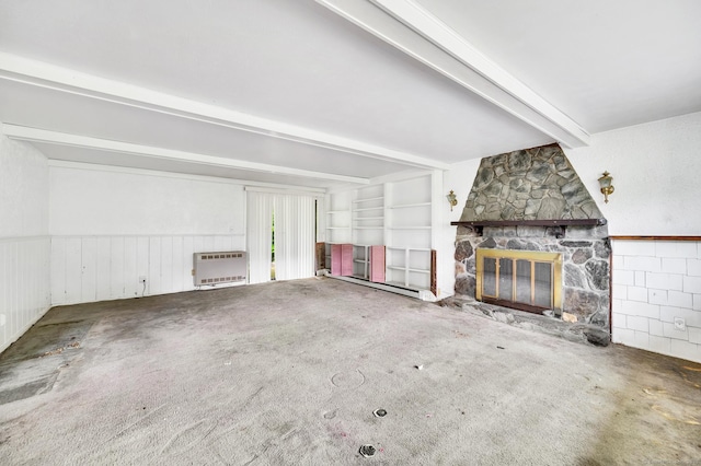 18 Hillcrest Dr, Somers, CT 06071 - unfurnished living room featuring heating unit, carpet, a fireplace, beam ceiling, and a baseboard radiator