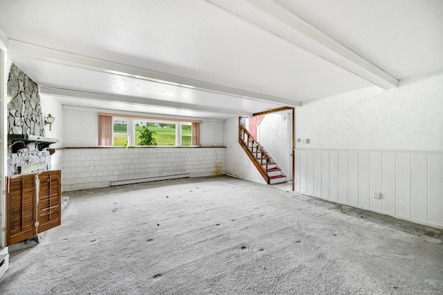18 Hillcrest Dr, Somers, CT 06071 - unfurnished living room with a baseboard radiator, beamed ceiling, carpet, stairs, and wainscoting