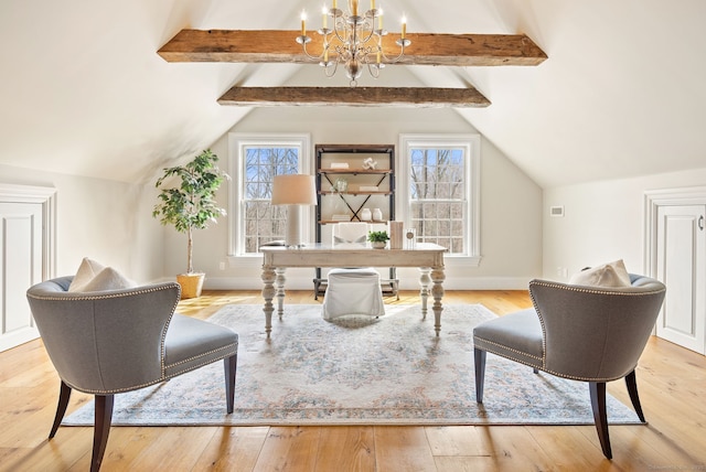 home office featuring an inviting chandelier, hardwood / wood-style floors, vaulted ceiling with beams, and a healthy amount of sunlight