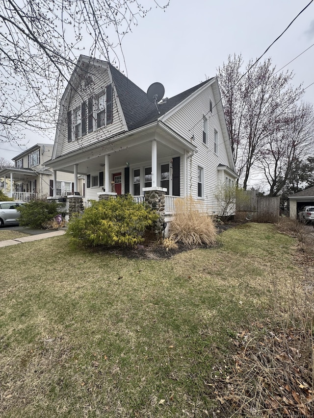 100 Ridgefield Ave, Waterbury, CT 06705 - view of front facade with a porch