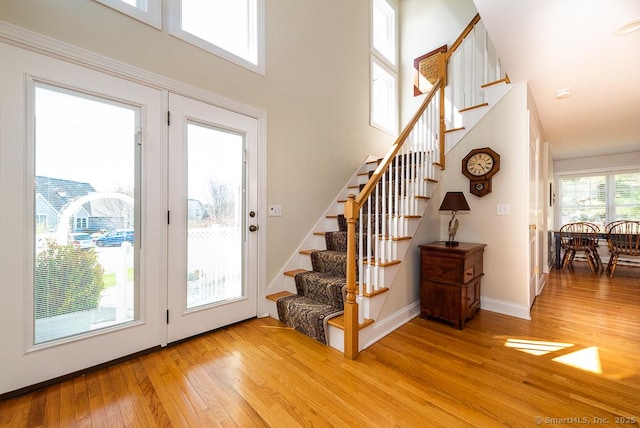88 Sconset Ln, Guilford, CT 06437 - interior space featuring a high ceiling, baseboards, and wood finished floors