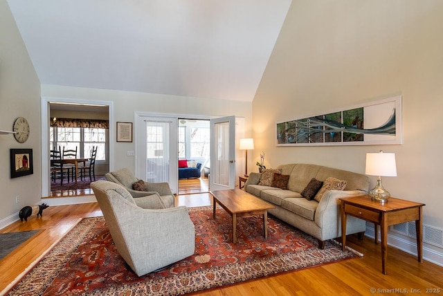 88 Sconset Ln, Guilford, CT 06437 - living room featuring plenty of natural light, baseboards, and wood finished floors