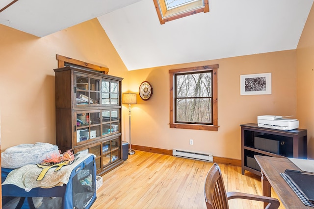 20 Sunrise Trl, East Lyme, CT 06333 - home office featuring a baseboard heating unit, a skylight, wood-type flooring, vaulted ceiling, and baseboards