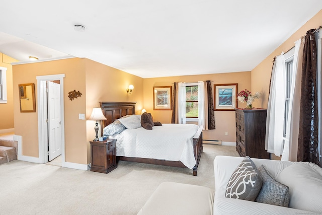 20 Sunrise Trl, East Lyme, CT 06333 - bedroom featuring baseboards, light colored carpet, and baseboard heating