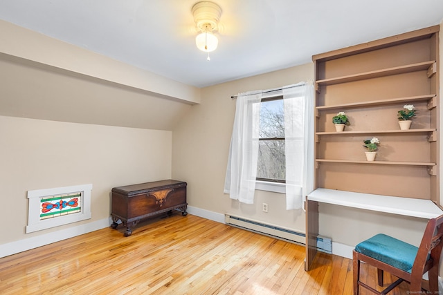 20 Sunrise Trl, East Lyme, CT 06333 - home office with baseboard heating, hardwood / wood-style flooring, vaulted ceiling, and baseboards