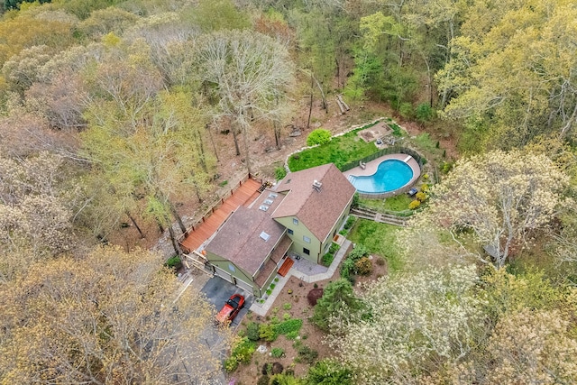 20 Sunrise Trl, East Lyme, CT 06333 - view of subject property with a pool and a heavily wooded area