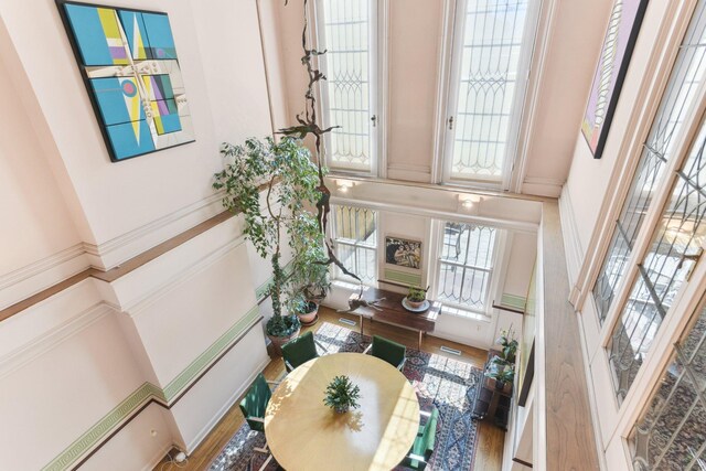 foyer featuring visible vents and wood finished floors