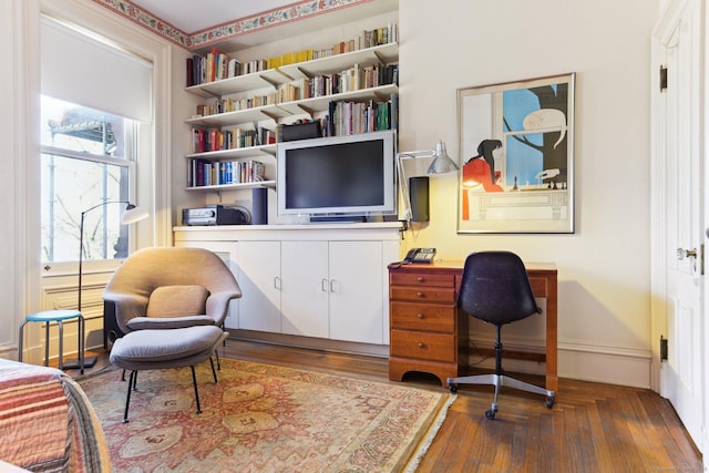 sitting room with wood finished floors