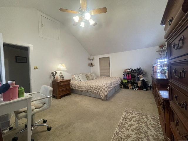 bedroom featuring lofted ceiling, ceiling fan, and light carpet
