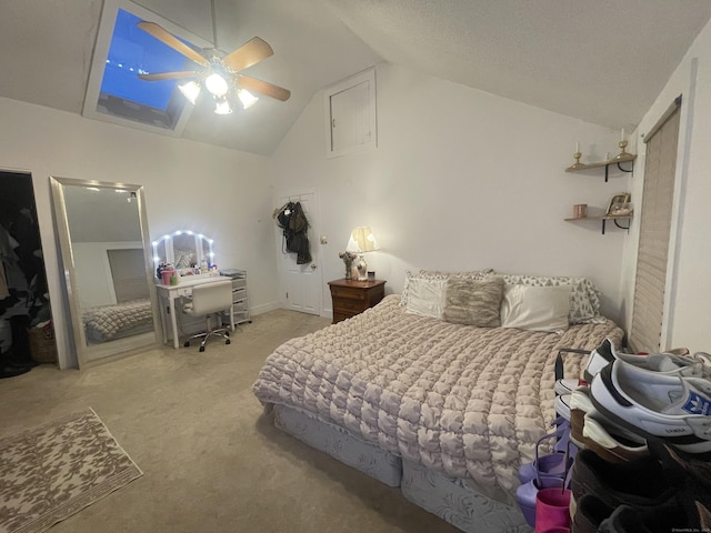 bedroom with carpet flooring, ceiling fan, and lofted ceiling