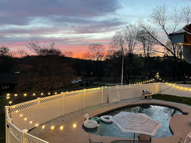 view of pool with a fenced in pool and a fenced backyard