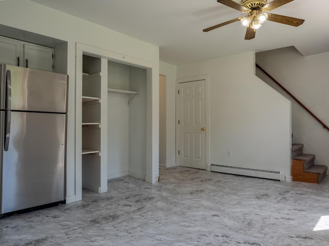 interior space featuring baseboard heating